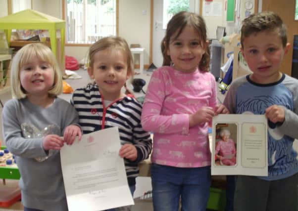 Happy children celebrate after receiving a letter from the Queen PHOTO: Supplied