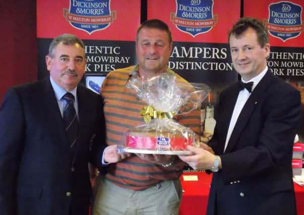 Club captain Jack Inguanta (left) with Nearest the Pork Pie winner Mark Lewis and Stephen Hallam (right) EMN-160706-151128002
