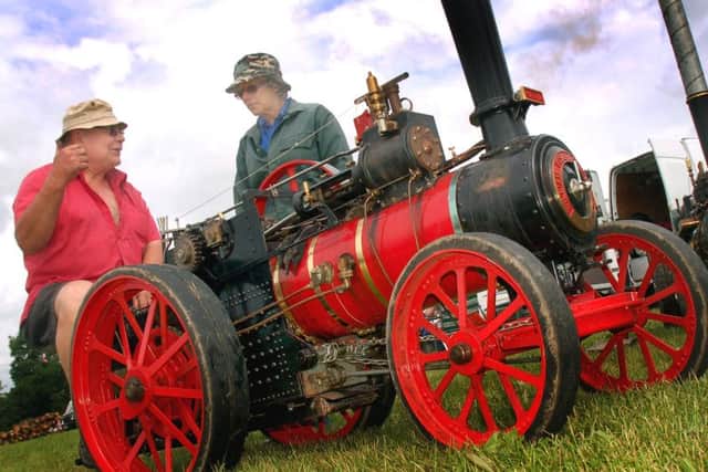 Pat Franks and June Riley discuss Pat's 4''scale model Foster engine PHOTO: Tim Williams