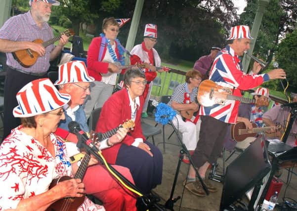 The Nottingham Ukulele Orchestra provided some musical accompaniment at the bandstand EMN-160613-100305001