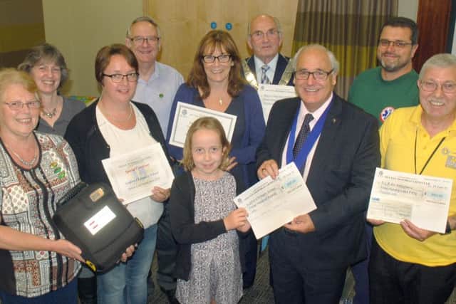 Cheque recipients from the Derbyshire, Leicestershire and Rutland Air Ambulance, the mayor's charities, Melton Mencap and First Responders, and certificate winners from John Ferneley College, Scalford and Grove primary schools 
PHOTO: Tim Williams