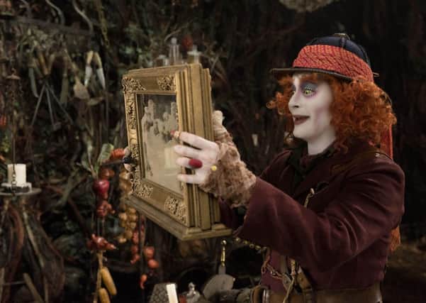 Johnny Depp stars in Alice Through The Looking Glass 
PHOTO: PA Photo/Disney/Peter Mountain