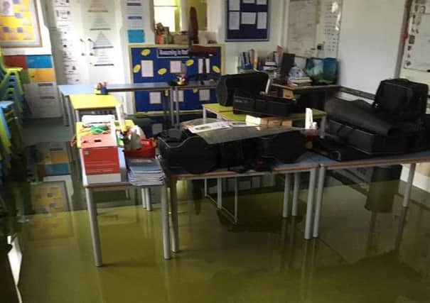 One of the flooded classrooms at Ab Kettleby Primary School EMN-160617-134322001