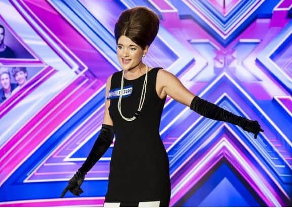 Lauren performs on the 2014 X Factor show. EMN-160617-150303001