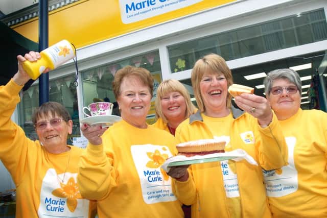 Marie Curie fundraisers serve up tea and cake at their fundraising party
PHOTO: Tim Williams