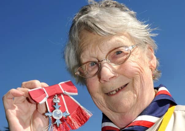Anne Lewis with her MBE EMN-160622-104427001