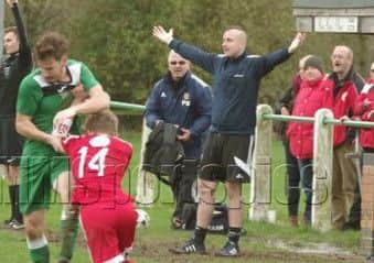 John Webster (arms outstretched) on the touchline at Melton last season EMN-160622-120005002