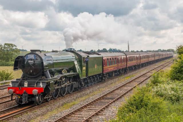 This image of Flying Scotsman as it approached Melton was taken by Melton Times reader Richard Miller. He took the photo from foot bridge near Freeby Close, where his mother lives. EMN-160627-173200001