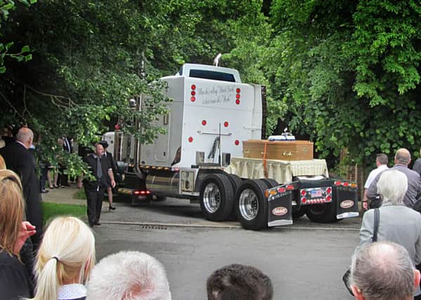 Dave's coffin carried by an American truck arrives at Asfordby All Saints Church EMN-160628-182352001