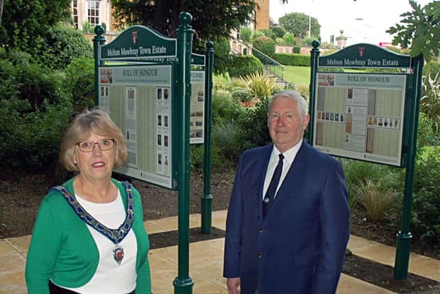 Melton Mowbray Town Estate feoffee John Southerington and senior townwarden Dinah Hickling with the new interpretation boards EMN-160628-185342001