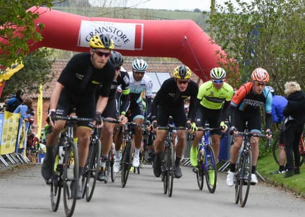 Riders stream through Owston during April's Rutland- Melton CiCLE Classic. Photo: Alan Walters EMN-160629-085740002