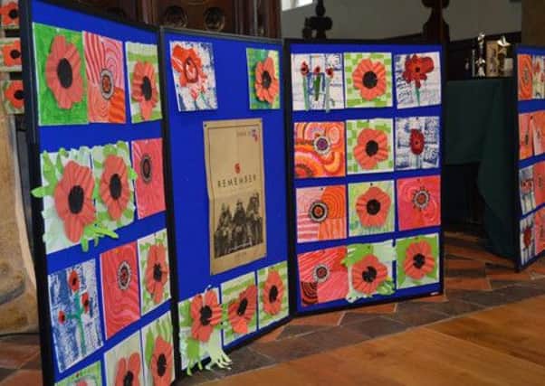 All of the Scalford Church of England Primary School pupils made distinctive poppy tiles which formed a poignant display throughout St Egelwins Church as part of their commemorations of 100 years since the Battle of the Somme EMN-160507-152742001