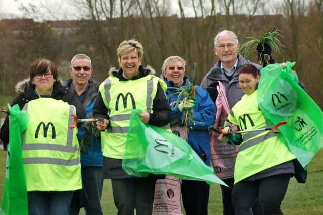 Friends of Melton Country Park and McDonalds staff prepare for planting and litter-picking last year EMN-160107-155549001