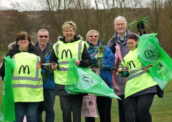 Friends of Melton Country Park and McDonalds staff prepare for planting and litter-picking last year EMN-160107-155549001