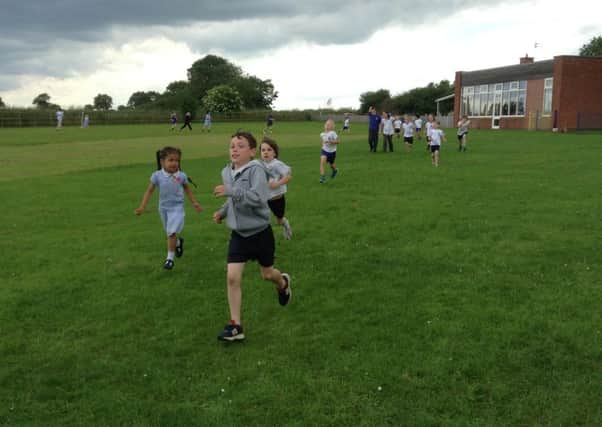 Wymondhams St Peters CE Primary School held a Race for Life on their school field 
PHOTO: Supplied