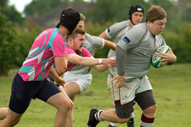 Christian Jeremiah breaks away for Melton RFC in their match with Leicester Forest at the Leics Under 20s Tens Tournament EMN-160707-111726002