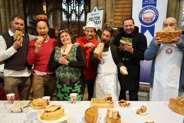 Some of the judges at this year's British Pie Awards in Melton's St Mary's Church. Pictured centre is British Pie Awards organiser Stephen Hallam, managing director of Dickinson and Morris. Melton's new PieFest event is hoping to build upon its success EMN-160807-170925001