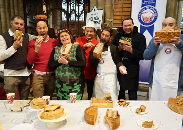 Some of the judges at this year's British Pie Awards in Melton's St Mary's Church. Pictured centre is British Pie Awards organiser Stephen Hallam, managing director of Dickinson and Morris. Melton's new PieFest event is hoping to build upon its success EMN-160807-170925001