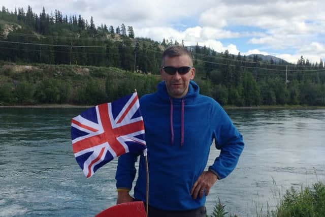 This photo was taken during Gary's pre-race preparation alongside the Yukon River EMN-160907-131232001