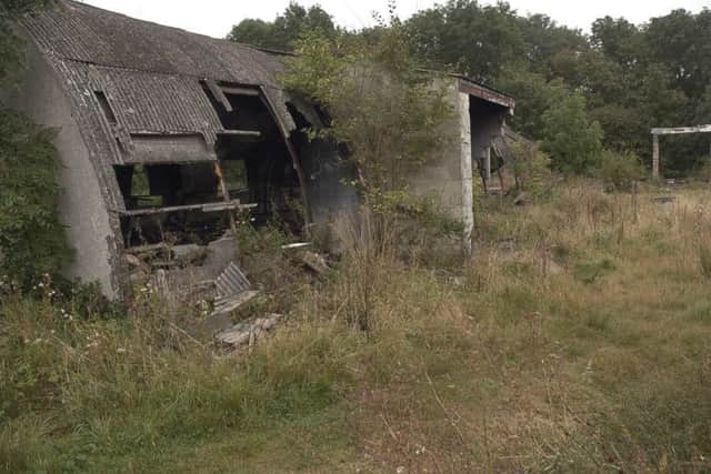 This photo of derelict buildings at the Sandy Lane site was taken in 2012 EMN-161107-163950001