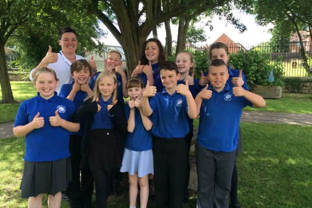 Pupils celebrate their good Ofsted with headteacher Rosie Browne PHOTO: Supplied