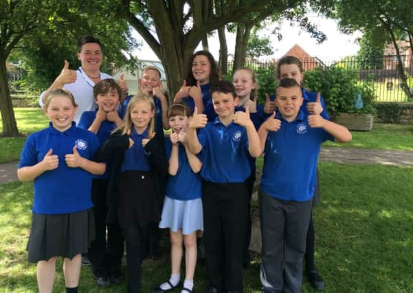 Pupils celebrate their good Ofsted with headteacher Rosie Browne PHOTO: Supplied