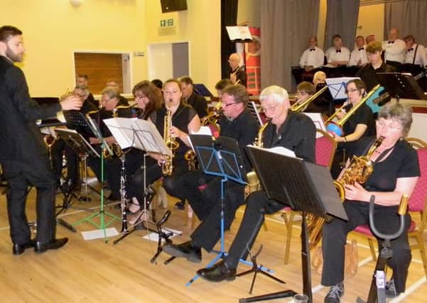 The Belvoir Big Band perform at Hose Village Hall with the Belvoir Wassailers on the stage behind 
PHOTO: Marian Dalby