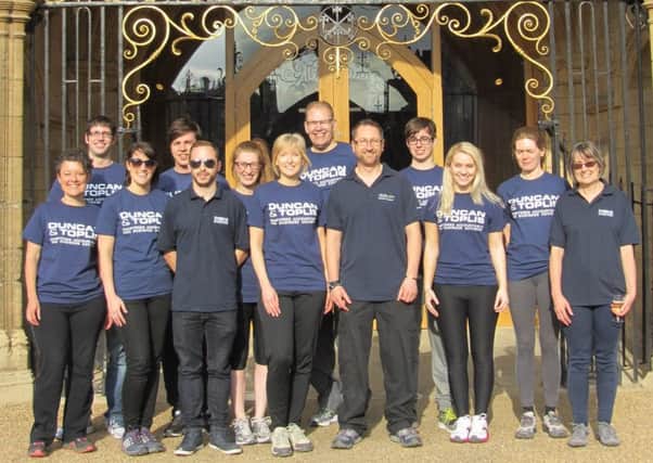 Duncan & Toplis colleagues who abseiled down Peterborough Cathedral for charity EMN-160714-182937001
