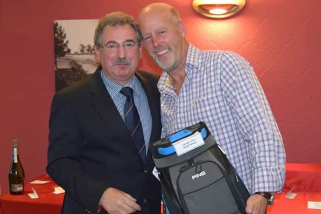 Club captain Jack Inguanta (left) with the overall Captains Day winner Trevor Jamson EMN-160719-110744002