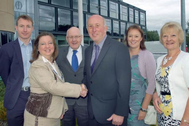 This photo taken in September shows Robert Child being congratulated by the now former Melton Mayor Jeanne Douglas and former Melton Council leader Byron Rhodes. Also pictured are Robert's proud family Mark, Sarah and wife Gill. EMN-160719-131744001