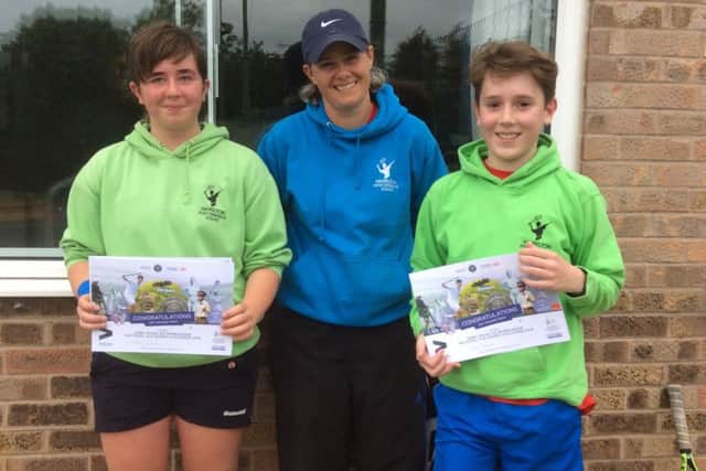 Road to Wimbledon winners Libby Duncan and Oliver Roberts with coach Di Burdett EMN-160719-170302002