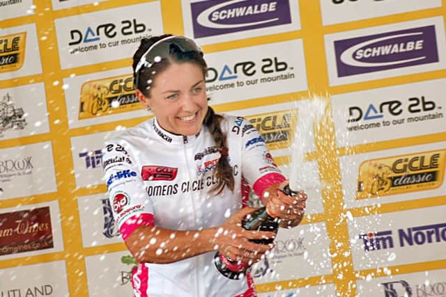 Champagne moment for winner Rebecca Durrell EMN-160720-092338002