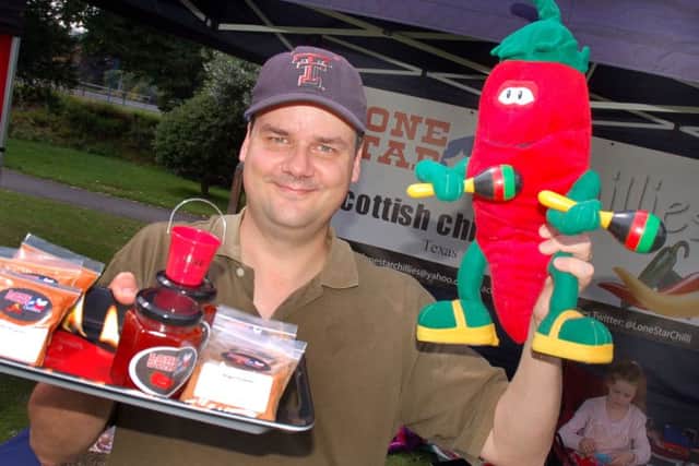 Hot stuff on offer from Russell Earhart of Lone Star Chillies EMN-160725-093400001