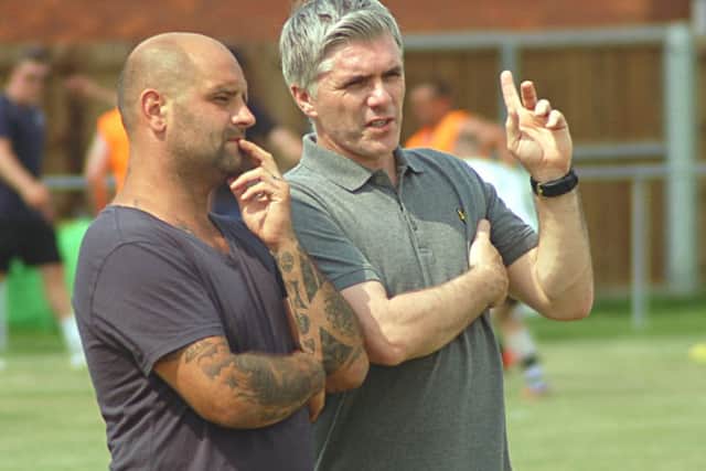 New Melton Town boss Tony Thorpe (right) mulls things over with assistant manager Ross Perkins EMN-160726-182823002