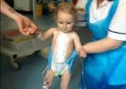 This photo of Poppy was taken as she first started walking after her second lot of heart surgery at the Glenfield at the age of 18 months old EMN-160727-124245001