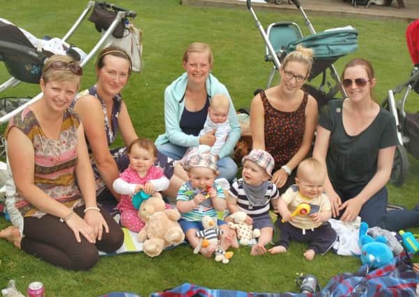 Mums and toddlers enjoy their picnic in the park 
PHOTO: Tim Williams