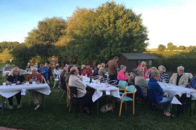 Guests enjoy summer barbecue event in the grounds of Dove Cottage PHOTO: Supplied