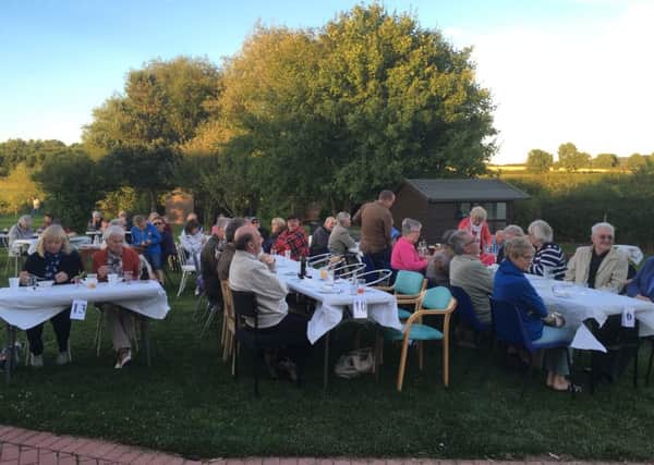 Guests enjoy summer barbecue event in the grounds of Dove Cottage PHOTO: Supplied