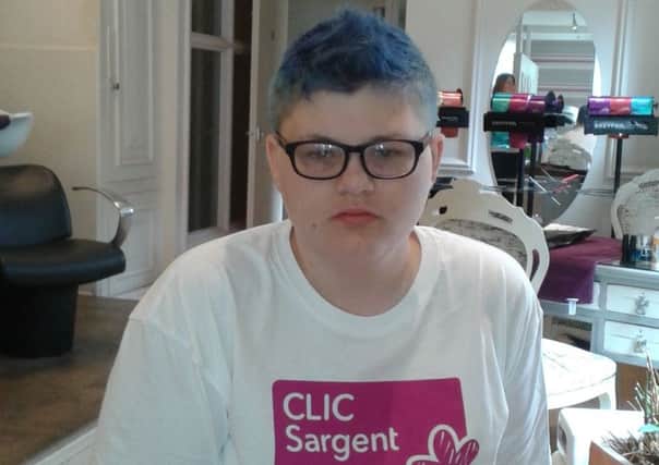 Jacob Watkins has dyed his hair bright blue and raised Â£165 for CLIC Sargent 
PHOTO: Supplied