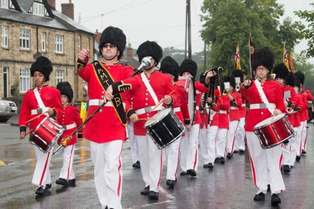 The Melton Toy Soldiers Band on the march at the Brackley Carnival procession last year EMN-160727-170725001