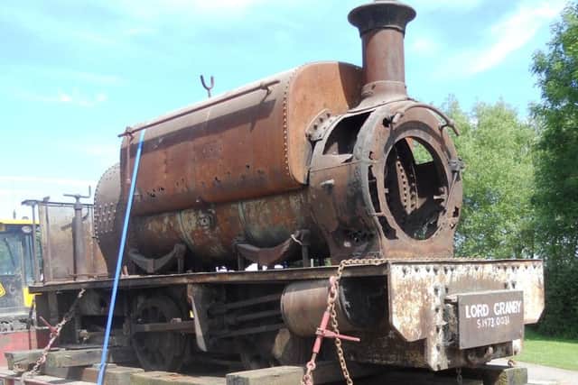 The Lord Granby locomotive which worked in the iron ore industry at Eastwell pictured here at it arrived back at the workshop for a restoration project EMN-160727-195830001