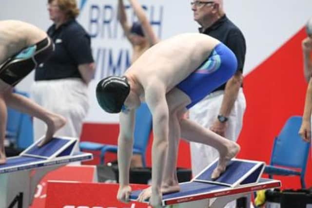 Will Graham on the starting blocks at the British Championships 100m butterfly final EMN-161008-122711002