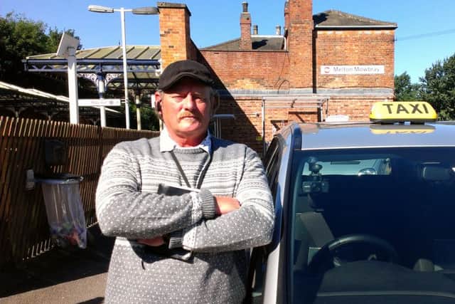 John Morrow, of Jackman Taxis, outside Melton train station EMN-161208-161855001