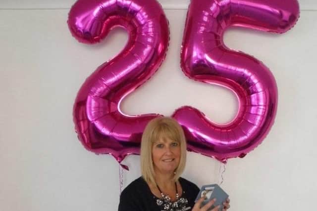 Mandy Cross is celebrating after reaching her 25th anniversary as a Slimming World consultant and achieving the prestigious Gold Award again in her Melton Morning Group, her fifth and final group to do so EMN-160816-093011001