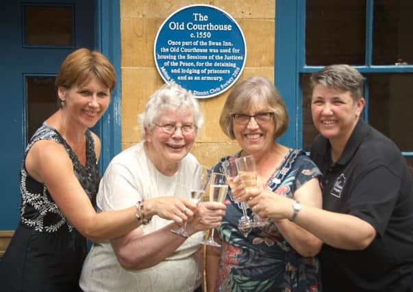 Toasting the occasion, from left, are Shelagh Core (Melton Mowbray BID manager), Dinah Rudman (former chairman of the civic society), Dinah Hickling (senior townwarden) and Sarah Martin Browne (owner of Whitehouse Photography) EMN-160816-121504001