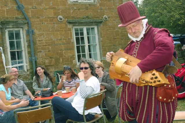 Hurdy-Gurdy man Paul Baker provides some medieval minstrel accompaniment PHOTO: Tim Williams