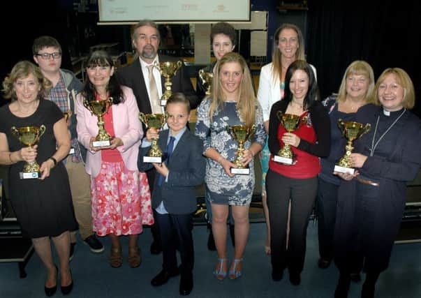 Last year's Melton Times Community Awards winners with their trophies EMN-151016-115510001 EMN-151016-115510001