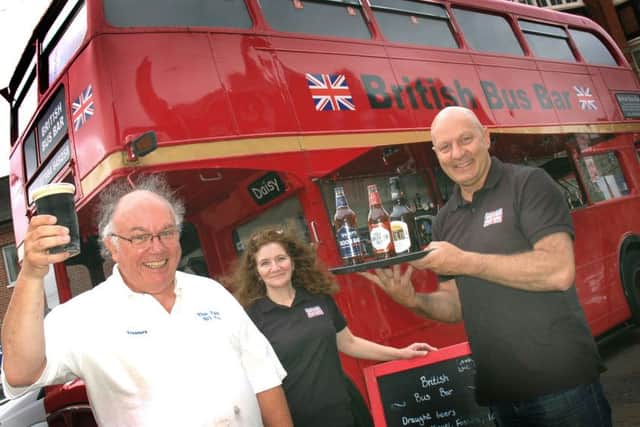 Bar Bus owners Nelly Miles and Wayne Hollobone supply 103 The Eye presenter Peter Treadwell with refreshment
PHOTO: Tim Williams