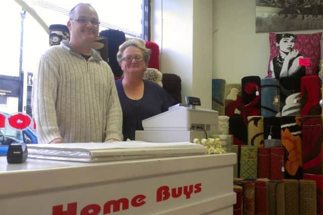 Jonathan Webb and his mum Irene at the new Home Buys store in Melton's The Mall shopping centre ENGEMN00120130916172535