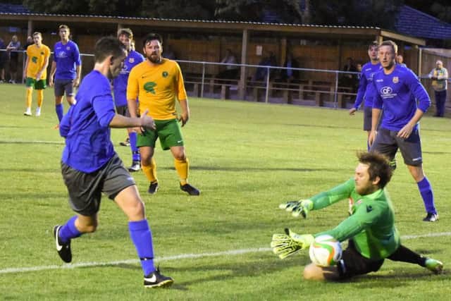 Action from Oakham United v Melton Mowbray. Photo: Alan Walters EMN-160825-095557001